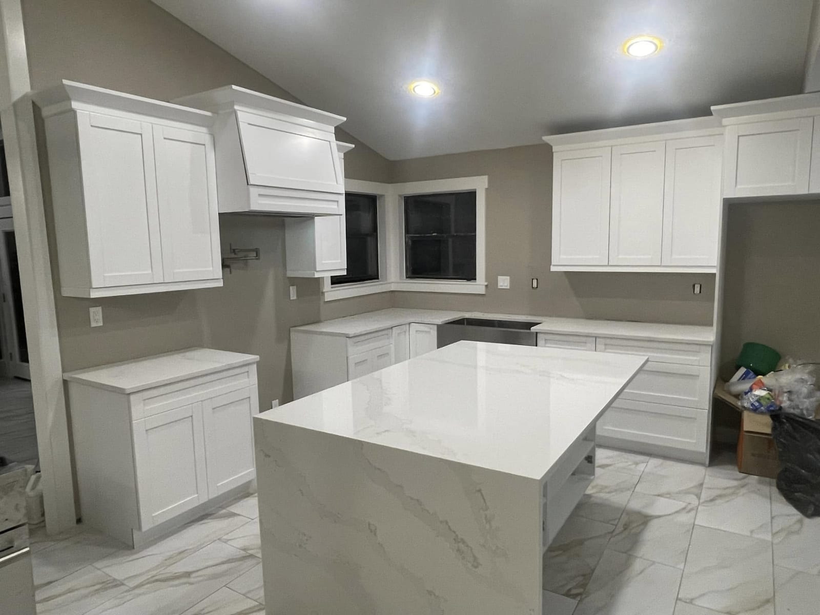 Gray and white marble countertop with built-in sink